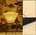 Akari 4A Table Lamp — collage of the lit lamp in front of a painted screen with paper close-ups — Captains Bamboo