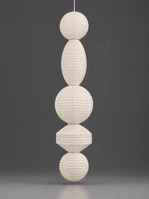 Akari M Series Ceiling Lamp — unlit stacked paper column of spheres and ovals on a grey studio backdrop — Captains Bamboo