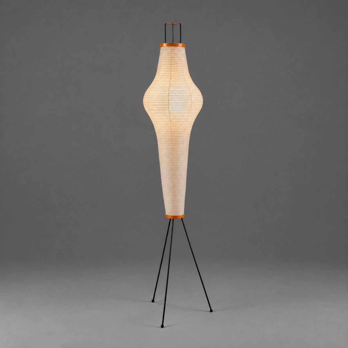 Akari 14A Floor Lamp — unlit teardrop shade narrowing to a long tapered stem on black legs — Captains Bamboo