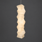 Akari 33N Paper Ceiling Lamp — lit wrinkled paper shade glowing warm on a dark gray studio background — Captains Bamboo