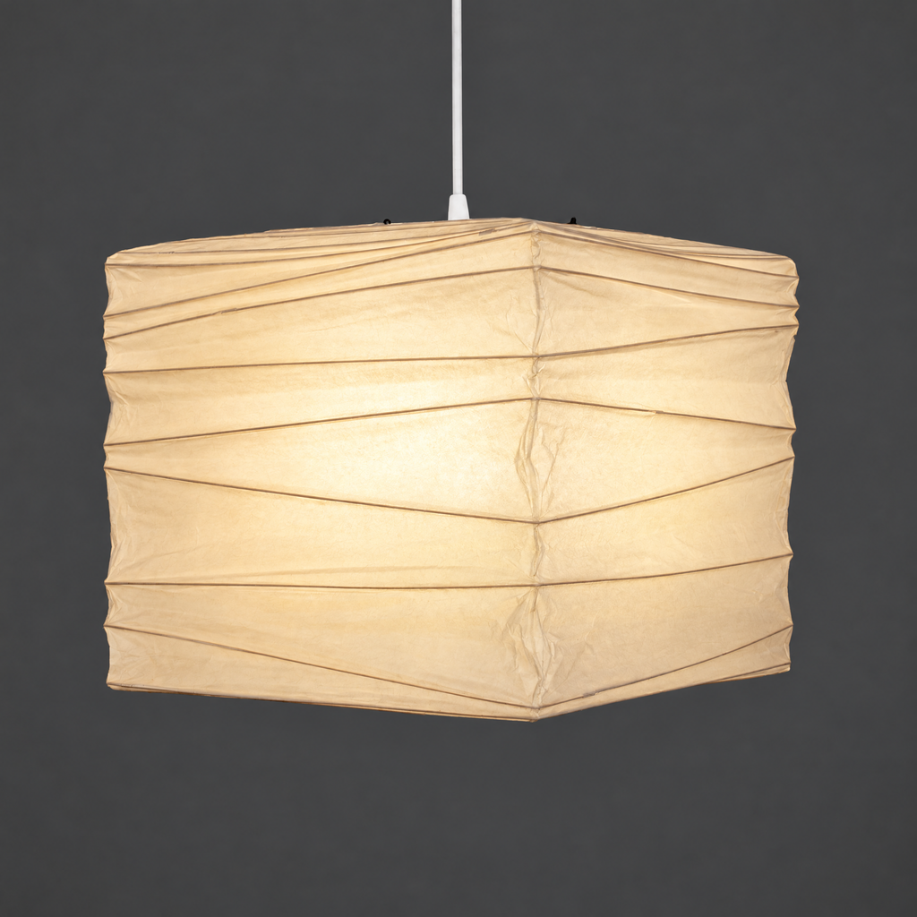 Akari 45X Washi Ceiling Lamp — the same cube shade lit, warm paper in the studio — Captains Bamboo