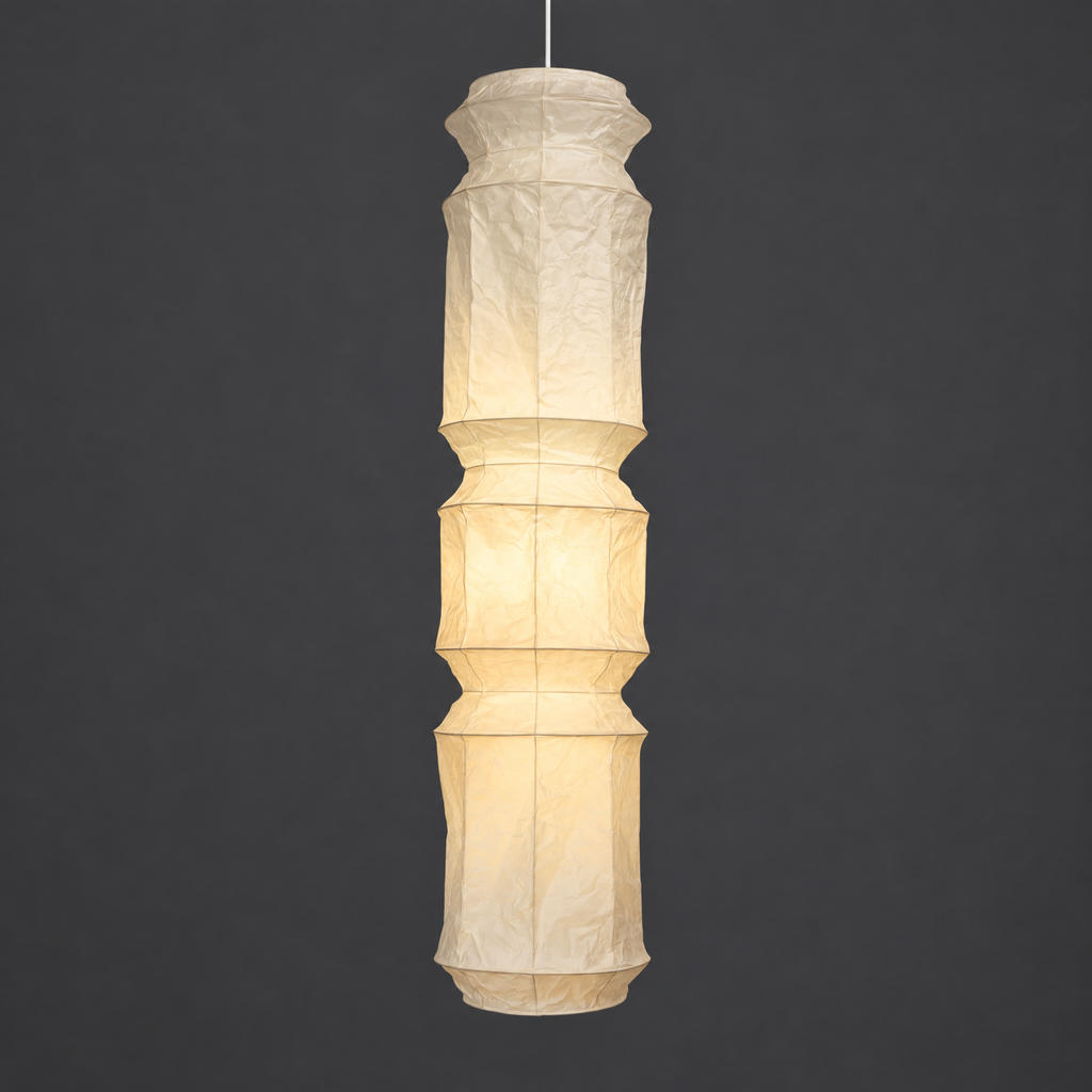 Akari L6 Paper Ceiling Lamp — lit stacked paper lantern shade glowing warm on a gray studio background — Captains Bamboo