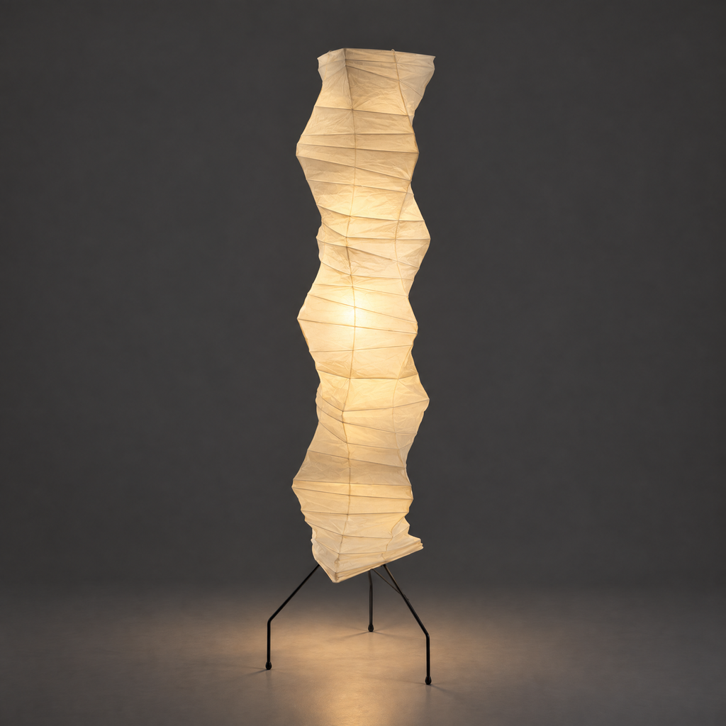 Noguchi UF4-33N Akari Floor Lamp — lit version of the wavy column shade, warm glow, dark studio backdrop — Captains Bamboo