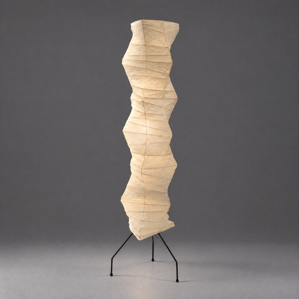 Noguchi UF4-33N Akari Floor Lamp — wavy wrinkled paper column shade unlit on tripod legs, grey backdrop — Captains Bamboo