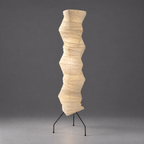Noguchi UF4-33N Akari Floor Lamp — wavy wrinkled paper column shade unlit on tripod legs, grey backdrop — Captains Bamboo